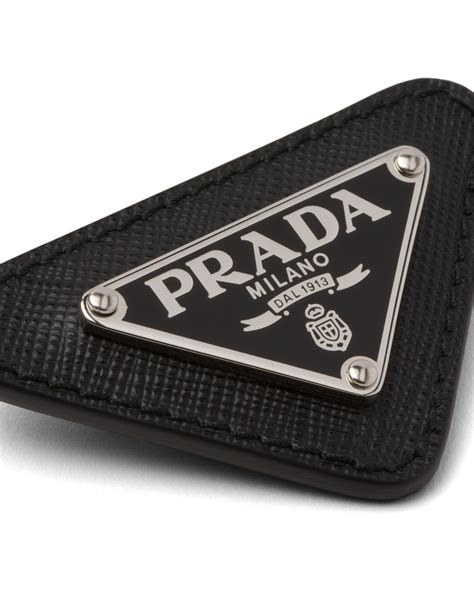 prada safety pin|prada triangular logo pin.